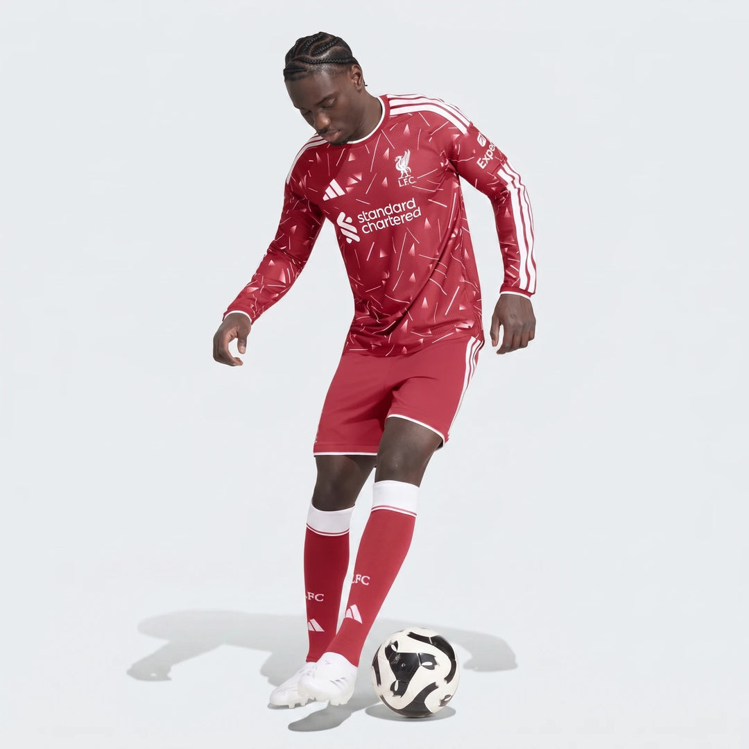 Liverpool FC 26 27 home authentic long sleeve jersey in red with white shoulder stripes and LFC crest, front view.