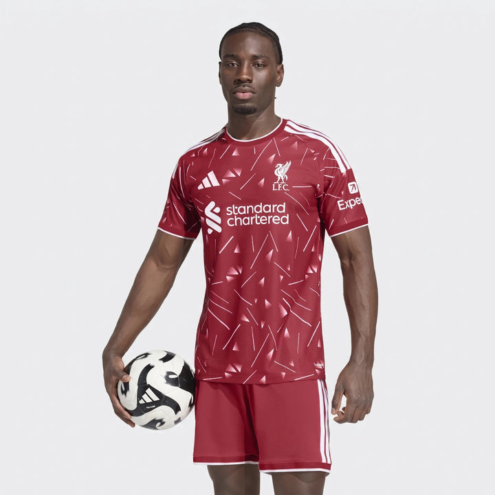 Liverpool FC 26/27 Home Jersey Authentic in deep red, short-sleeve front view with geometric pattern and crest.