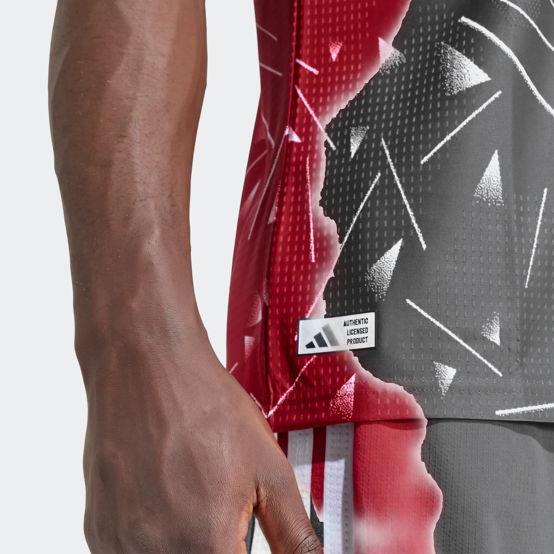 Liverpool FC 26/27 Home Jersey Authentic in red, close-up side view showing geometric print and authentic patch.