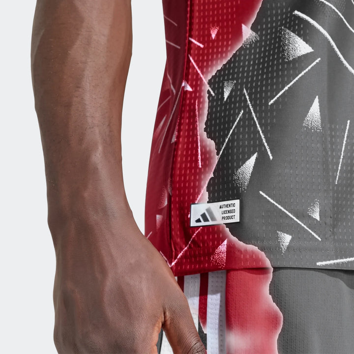 Liverpool FC 26/27 Home Jersey Authentic in red, close-up side view showing geometric print and authentic patch.