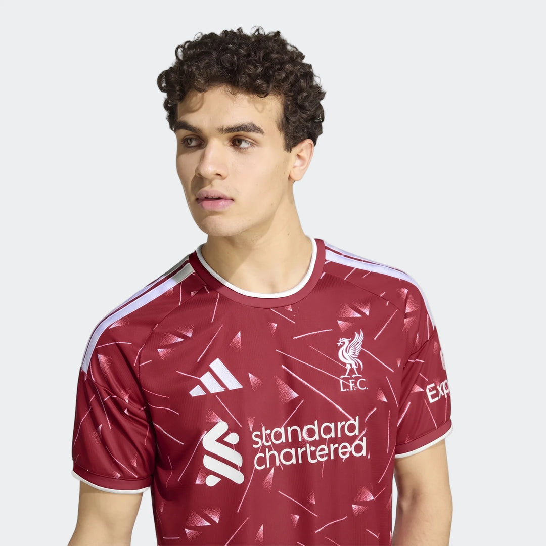 Liverpool Fc 26/27 Home Jersey in deep red with white trim, short sleeve, front view showing LFC crest