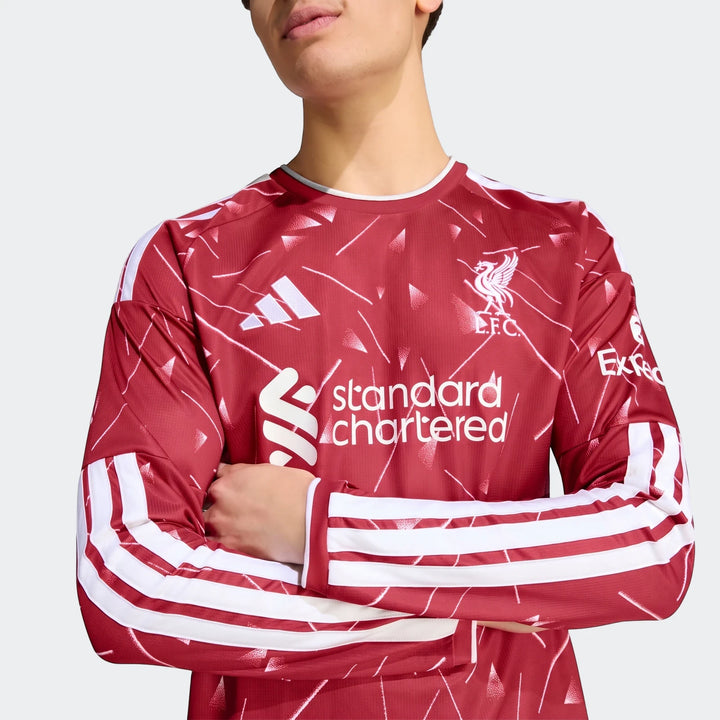 Men's Liverpool FC 26/27 Home Jersey Long Sleeve with white geometric pattern, Adidas stripes, and sponsor logos on a model