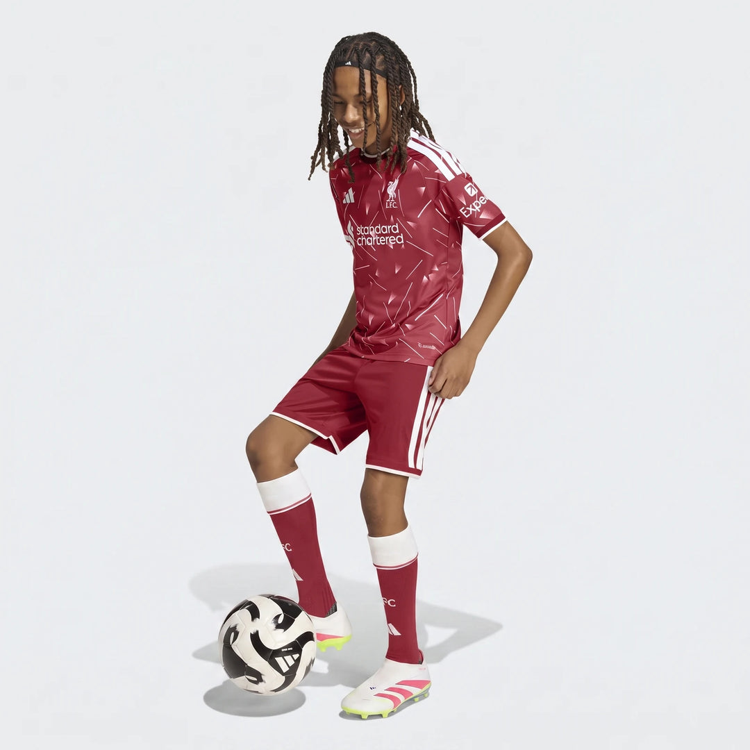 Liverpool FC 26/27 home shorts kids in red with white side stripes, front view football kit shorts.