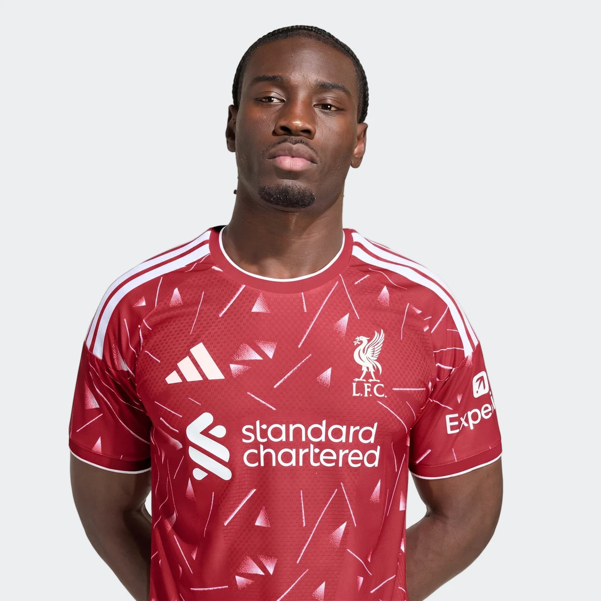 Liverpool FC 26/27 Home Jersey Authentic in red with white geometric print, short sleeves, front view crest.