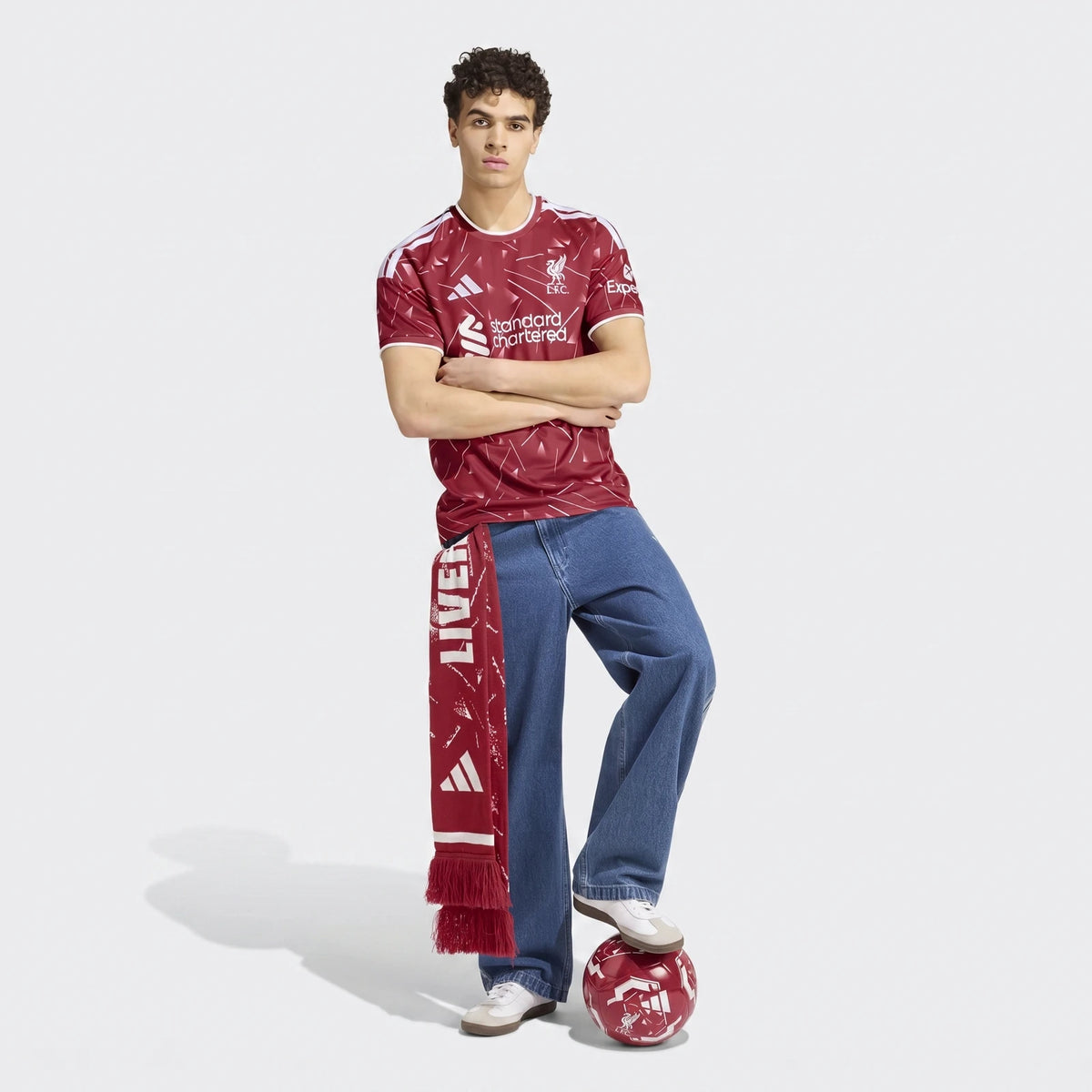 Liverpool FC 26/27 home jersey in deep red with white trim, short sleeves and club crest, front view.