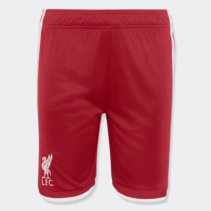 Liverpool FC 26/27 home shorts for kids in red with white side stripes and LFC crest, front view.