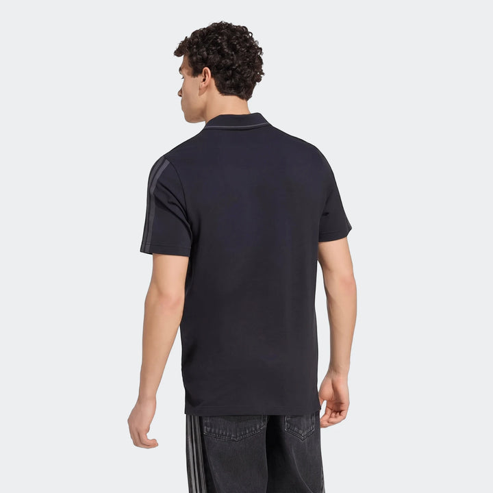 Dark navy Liverpool FC DNA Polo Shirt for men, featuring three stripes on the sleeves, shown from the back perspective.