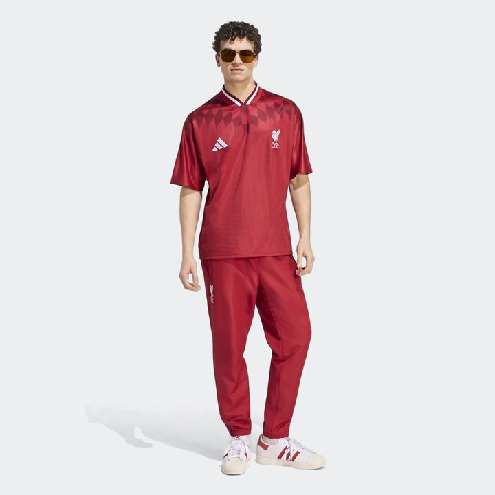 Liverpool FC Street Jersey in deep red, short-sleeve football top with LFC crest and patterned shoulders, front view