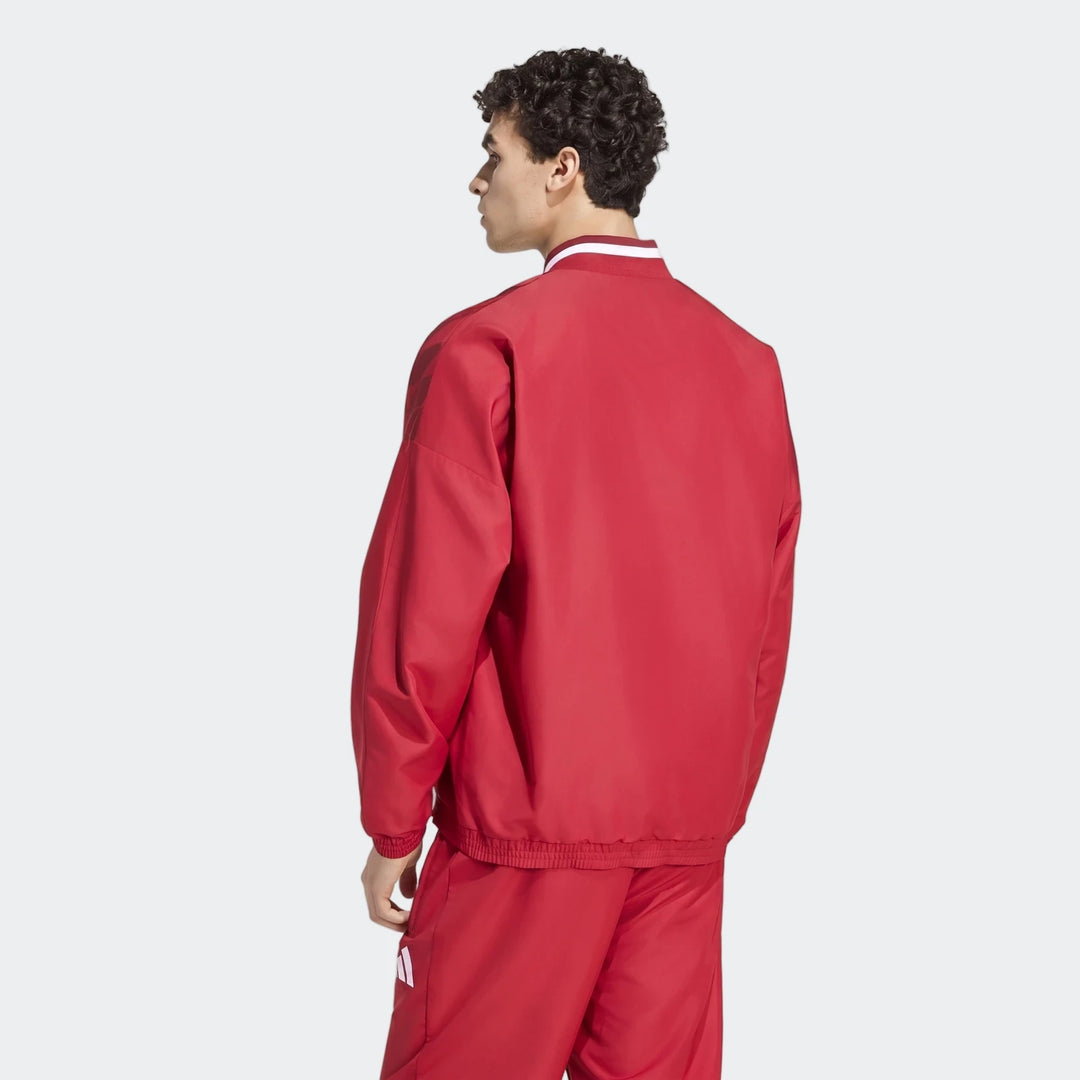 Liverpool FC Street Track Top in red, back view with ribbed collar and white stripe trim and elastic hem.