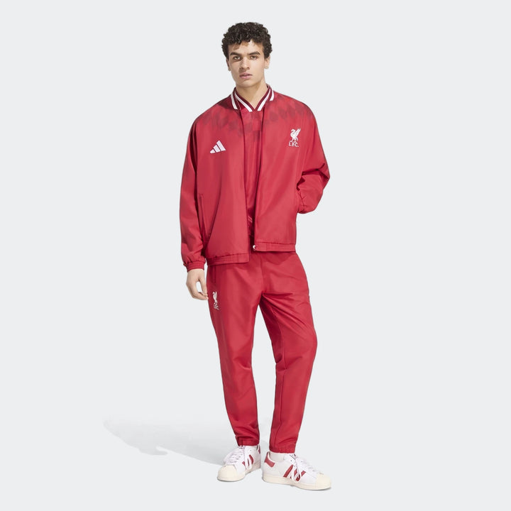 Liverpool FC Street Track Top in red, front view with zip closure, ribbed collar and LFC crest on chest.