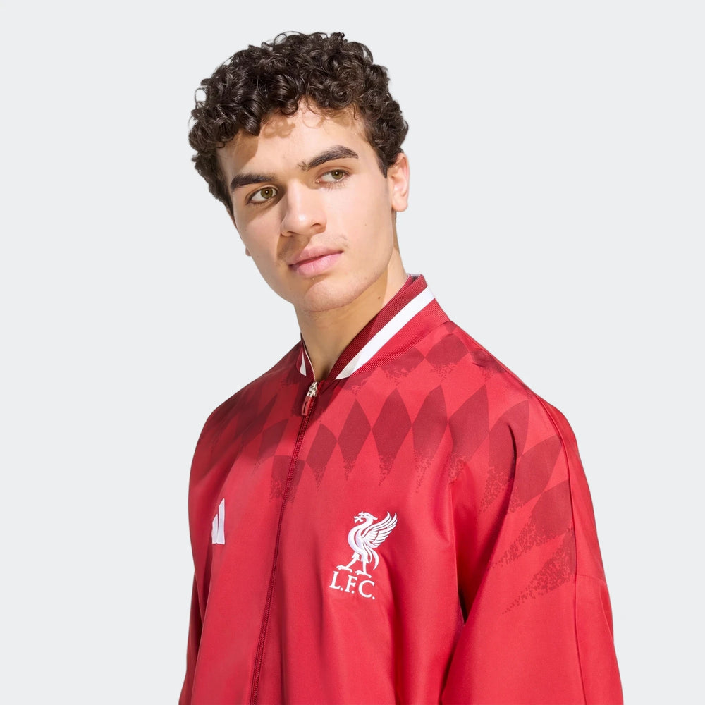 Liverpool FC Street Track Top in red with full zip front, ribbed collar, and LFC crest on the chest, side view.