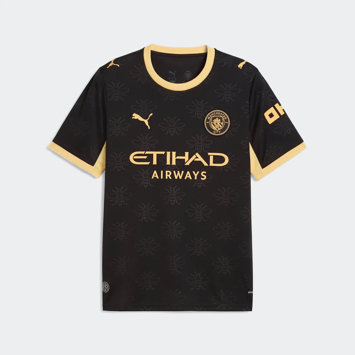 Manchester City 26/27 Away Jersey for men, featuring a black and gold design with bee patterns, displayed flat-lay.