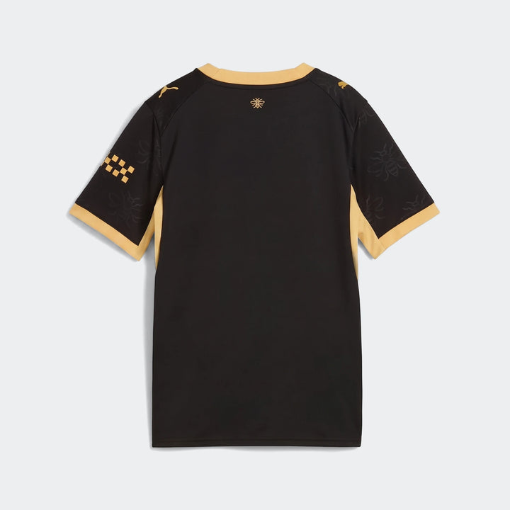 Back view of the Manchester City 26/27 Away Youth Jersey, black with gold trim, bee pattern, and checkerboard details.