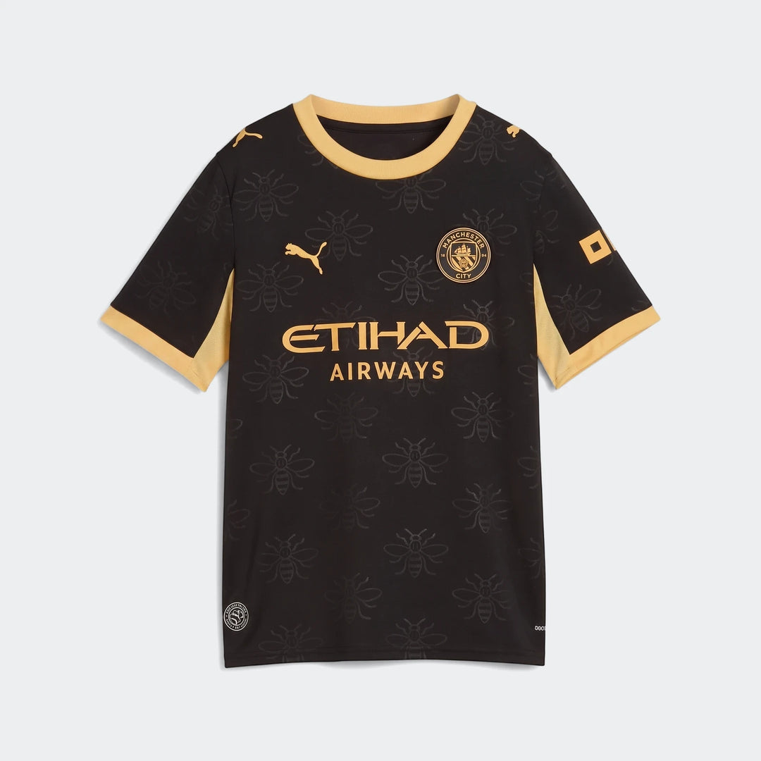 Youth Manchester City 26/27 Away Jersey in black and gold with a subtle bee pattern and sponsor logos.