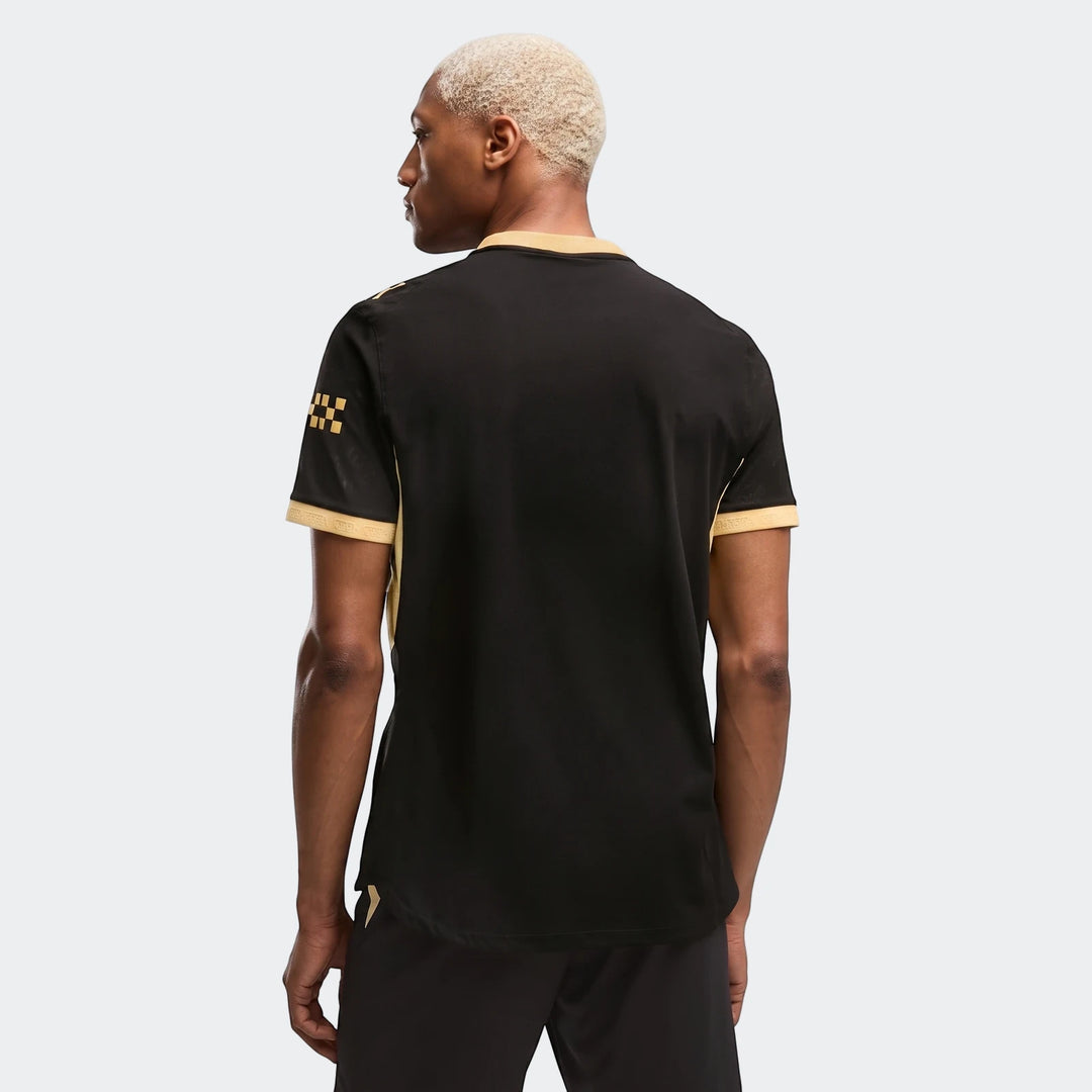 Men's Manchester City Away Authentic Jersey in black and gold, featuring a checkerboard sleeve detail, seen from the back.