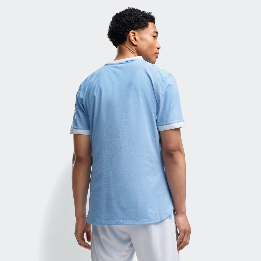 Men's light blue Manchester City Home Authentic Jersey, short sleeve, shown from the back view on a model.