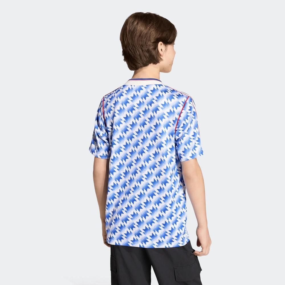 Manchester United 1990 Away Jersey Kids in blue and white geometric print, short sleeve soccer shirt, back view.