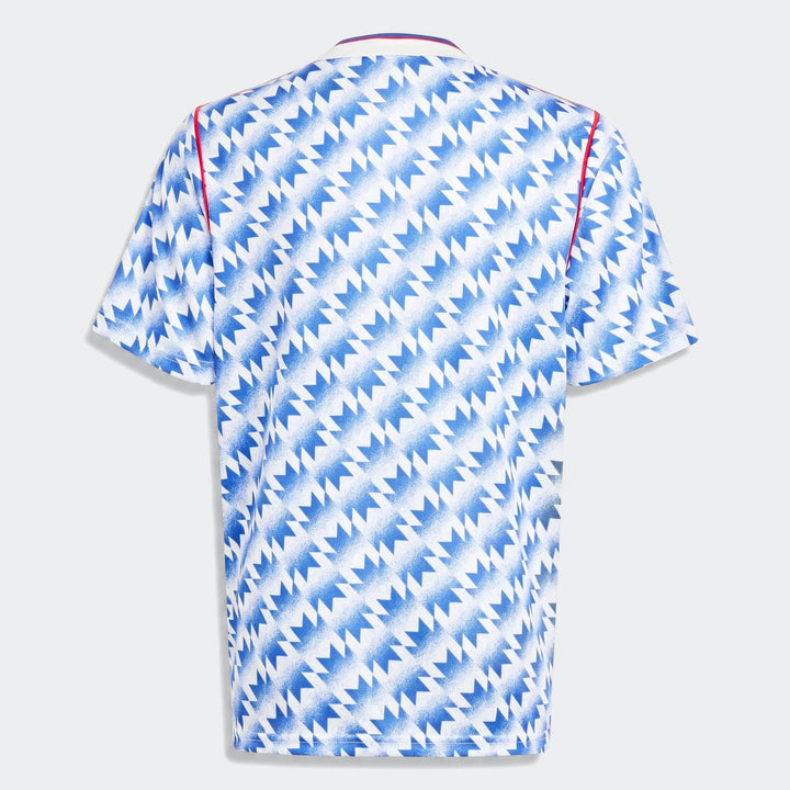 Manchester United 1990 Away Jersey Kids, back view with blue and white zigzag pattern and red trim.