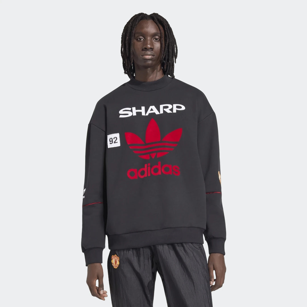 Manchester United 1990 sweatshirt in black, front view crewneck with red adidas trefoil and Sharp logo
