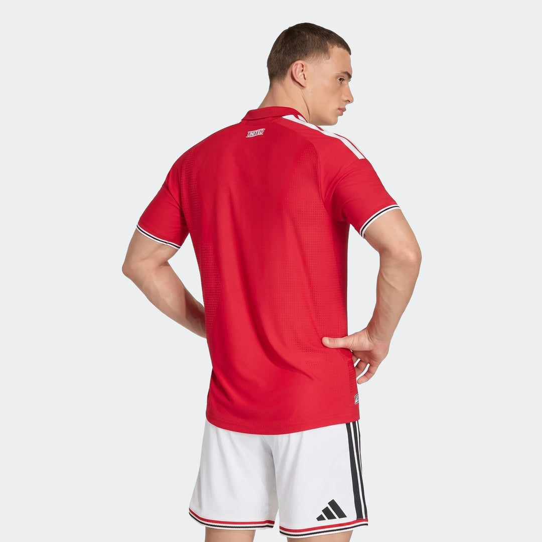 Manchester United 26/27 Authentic Home Jersey in red, back view with white shoulder stripes and ribbed collar.