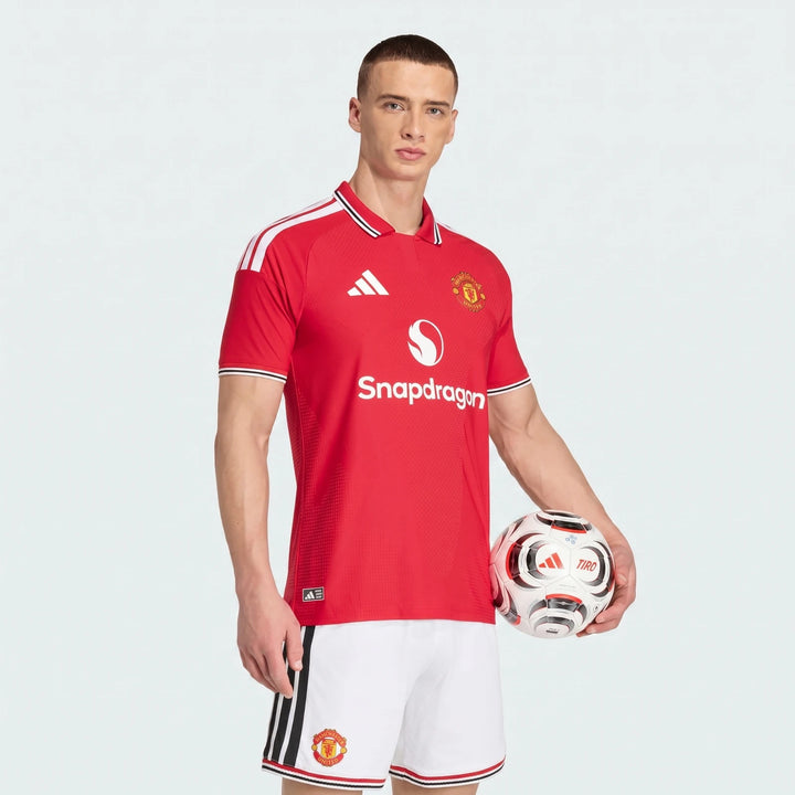 Manchester United 26/27 Authentic Home Jersey in red, short-sleeve front view with club crest and striped collar.
