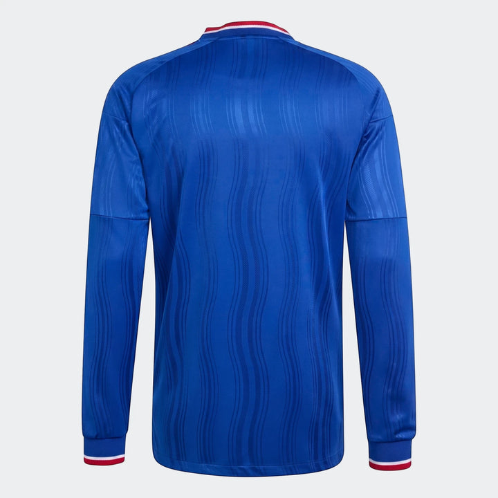 Back view of a blue Manchester United 26/27 Away Authentic Longsleeve Jersey with red and white trim.