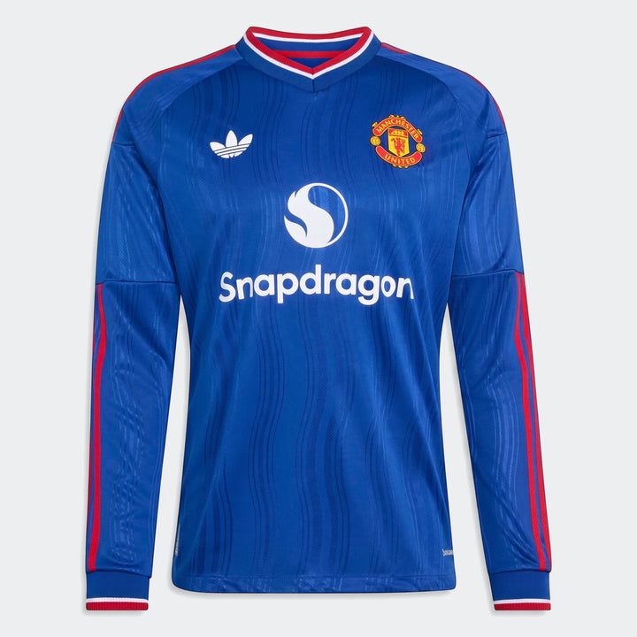 Manchester United 26/27 away authentic long-sleeve jersey in blue, featuring the club crest and Snapdragon sponsor logo on