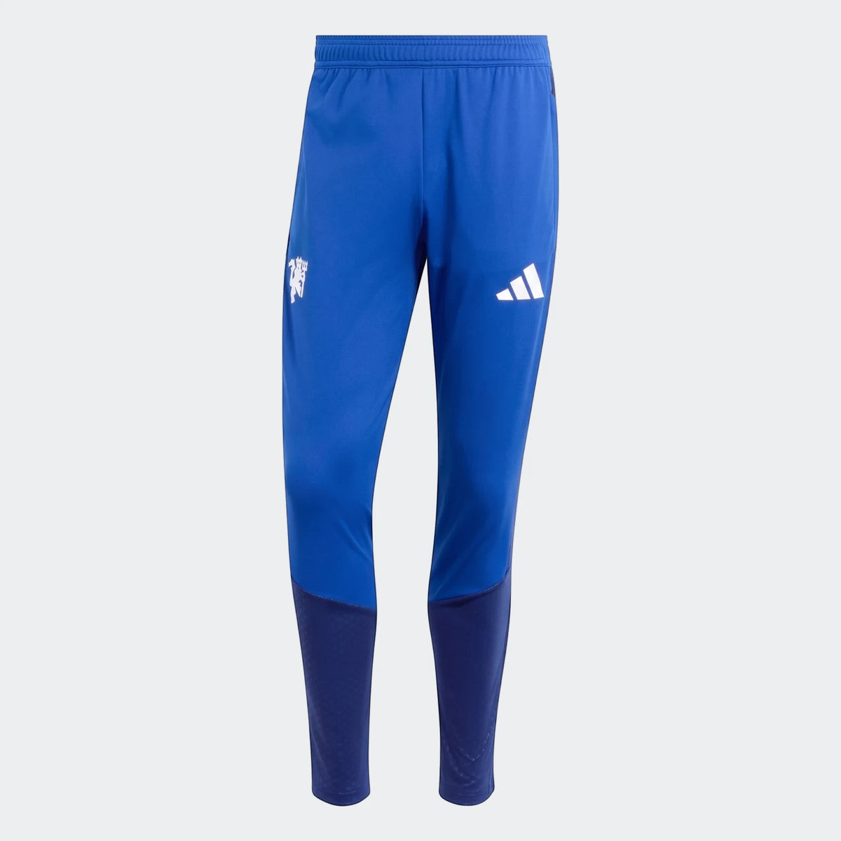Manchester United 26/27 Cup Tiro Training Pants for men, featuring blue and dark blue panels, Adidas logo, and club crest.