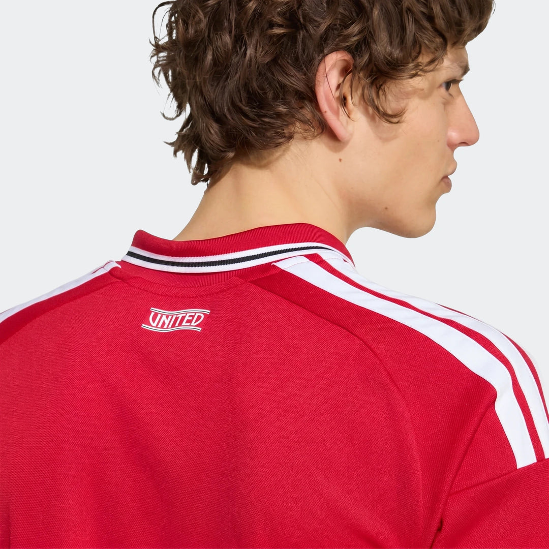 Manchester United 26/27 Home Jersey, back view in red with white shoulder stripes and ribbed collar