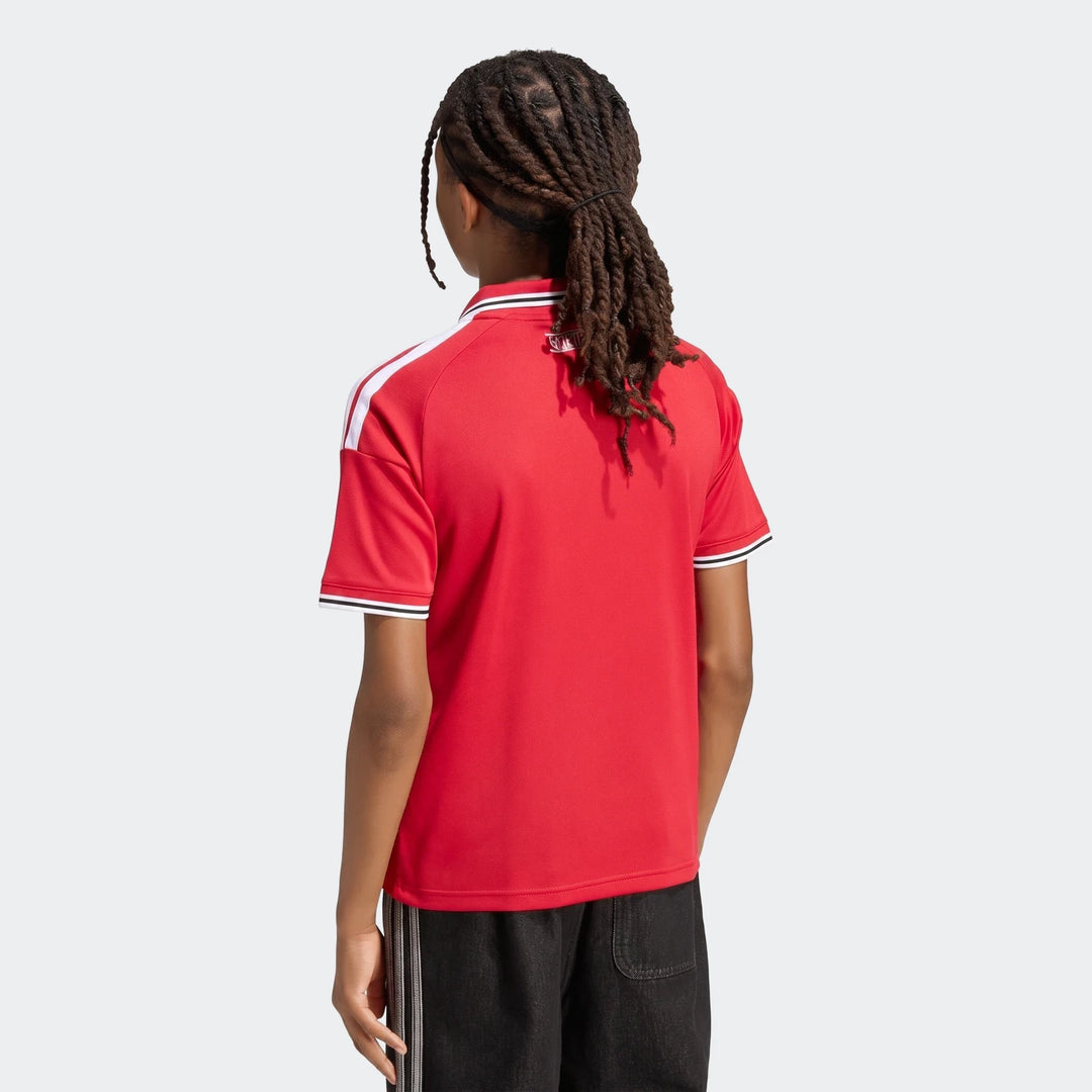 Manchester United 26/27 Home Jersey Youth in red, back view showing short sleeves with white trim and collar.