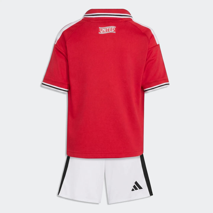 Back view of the Manchester United 26/27 Home Mini Kit, featuring a red jersey with white details and white shorts with