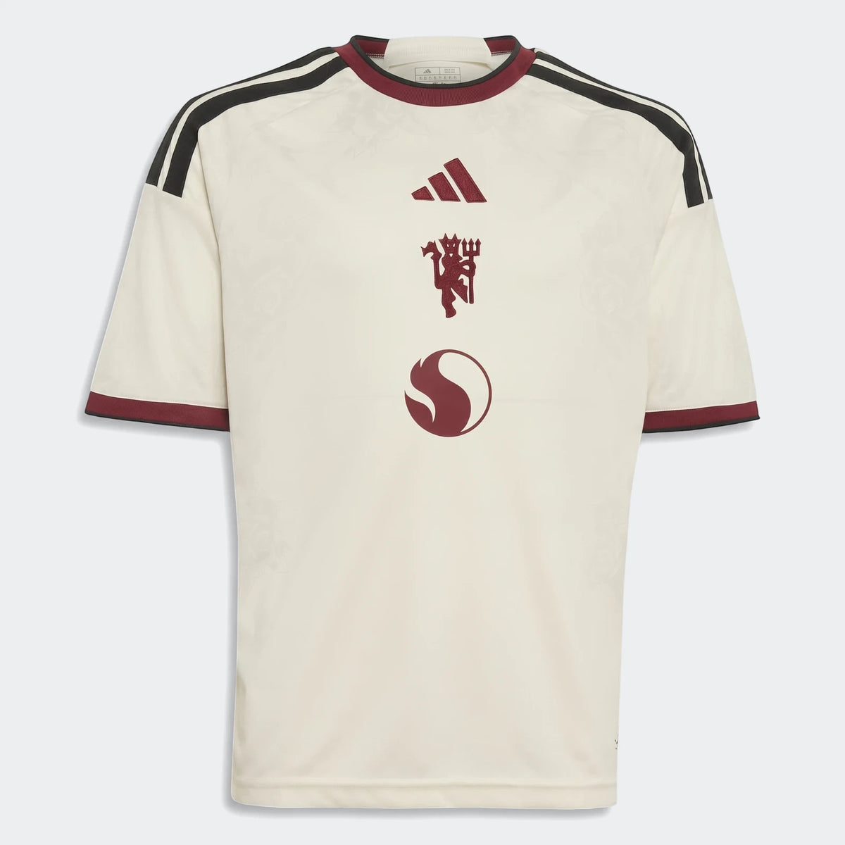 Manchester United 26/27 Third Kids' Jersey in off-white with maroon trim, black stripes, and team crest, front view.
