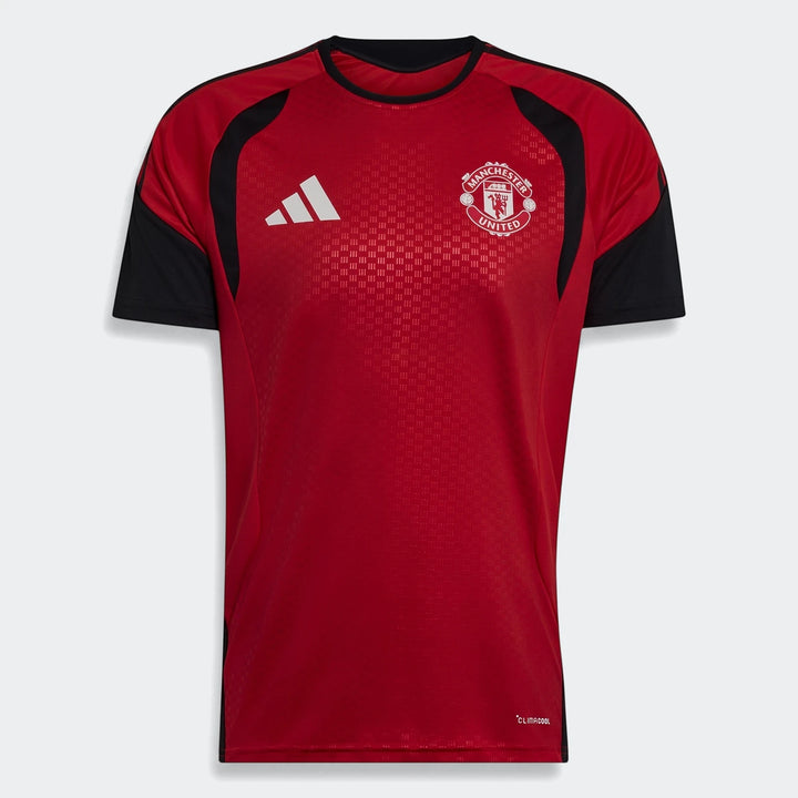 Manchester United 26/27 Tiro Training Jersey in red and black, featuring Adidas logo and club crest, displayed flat.
