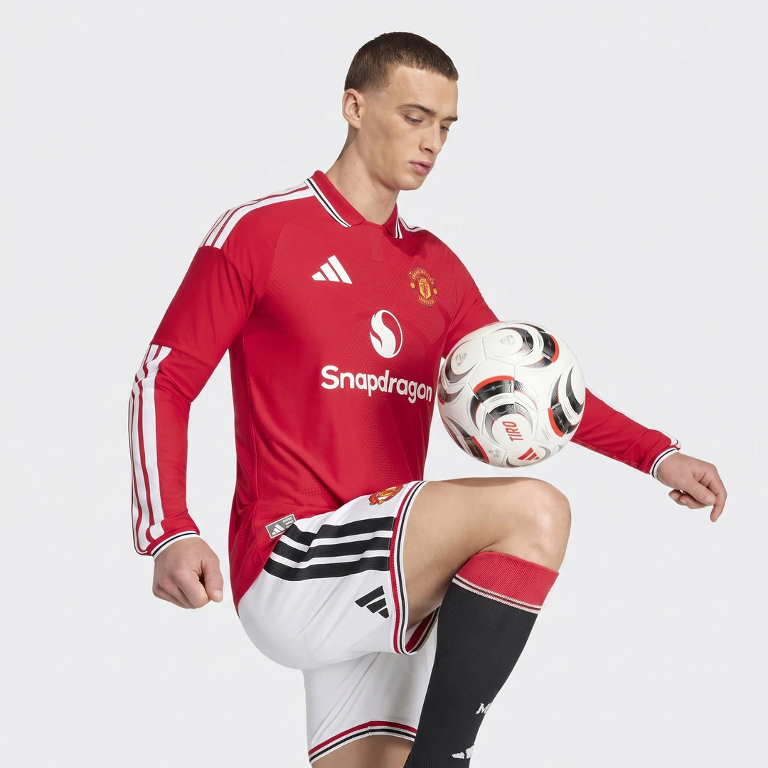 Manchester United 26/27 Authentic Long Sleeve Home Jersey in red with white stripes and club crest, front view.