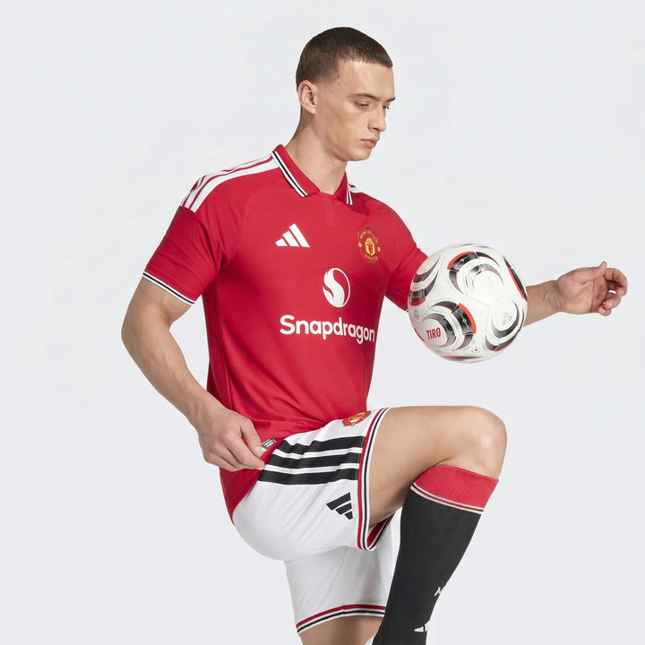 Manchester United 26/27 Authentic Home Jersey in red, short sleeve with club crest and white shoulder stripes, front view.