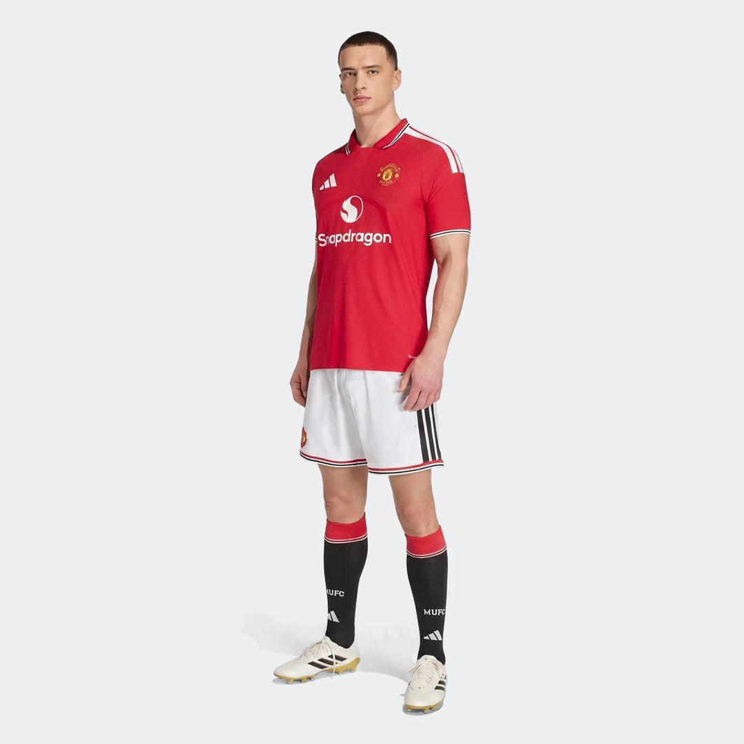 Manchester United 26/27 Authentic Home Jersey in red, short-sleeve soccer shirt with club crest, front view.