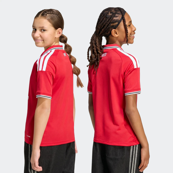 Manchester United 26/27 Home Jersey Youth in red with white shoulder stripes, back and side view.