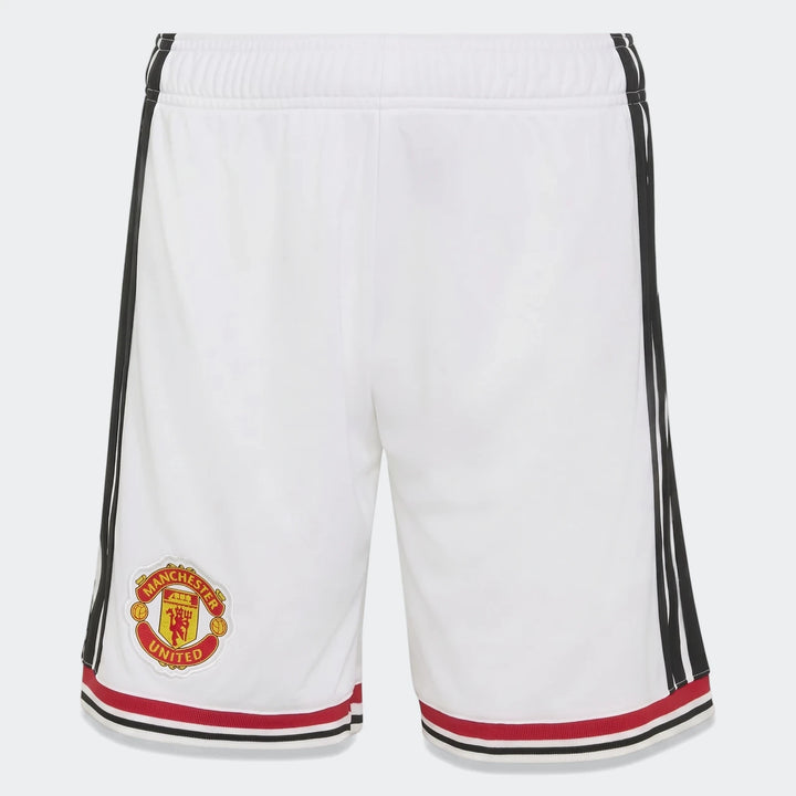 Manchester United 26/27 Home Shorts Youth in white with black side stripes and club crest, front view.