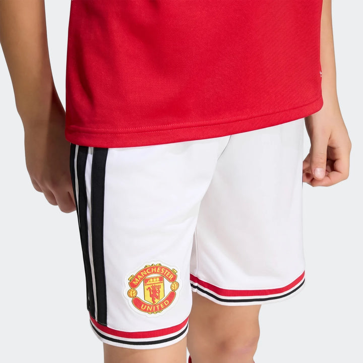 Manchester United 26/27 Home Shorts Youth in white with black side stripes and club crest, front view