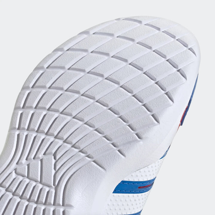 Sole of a Marvel Lightorama Runner Spider-Man Light-Up Kids Shoe, showing the white textured grip and blue and red side