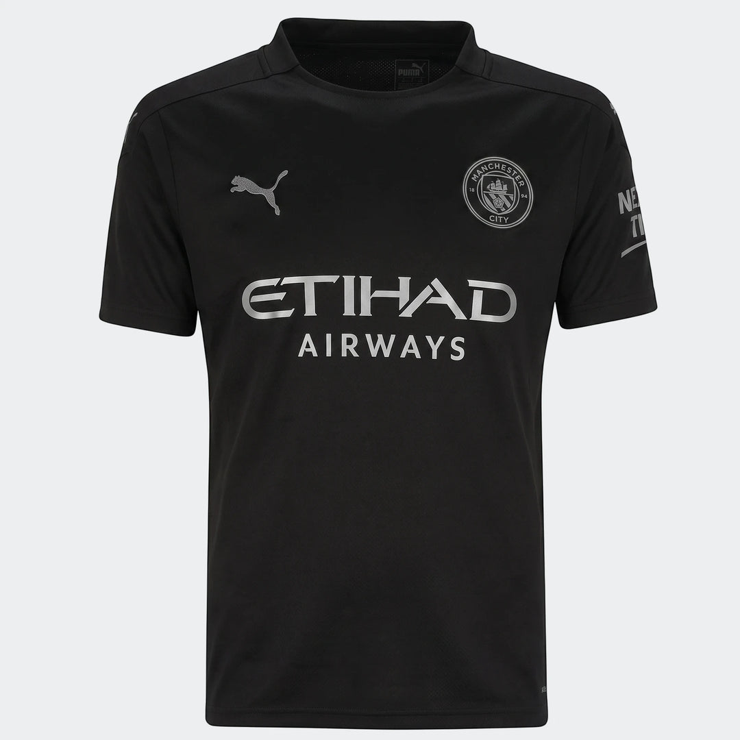 Black short-sleeved Manchester City F.C. 25/26 replica third jersey with team crest and sponsor logos visible on the front.