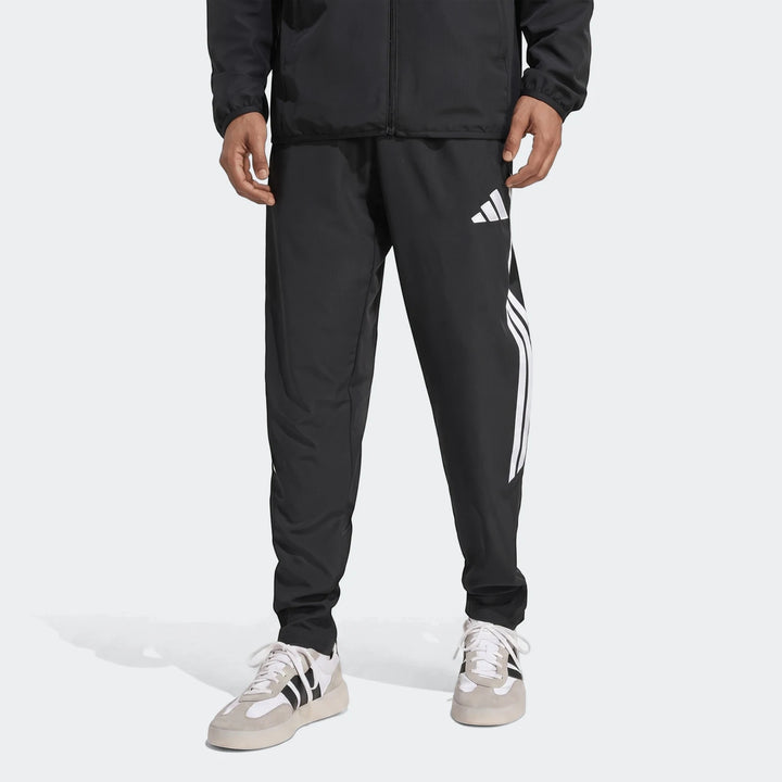 Men's black Adidas Tiro 26 League Presentation Pants with white three stripes, shown from a front view.