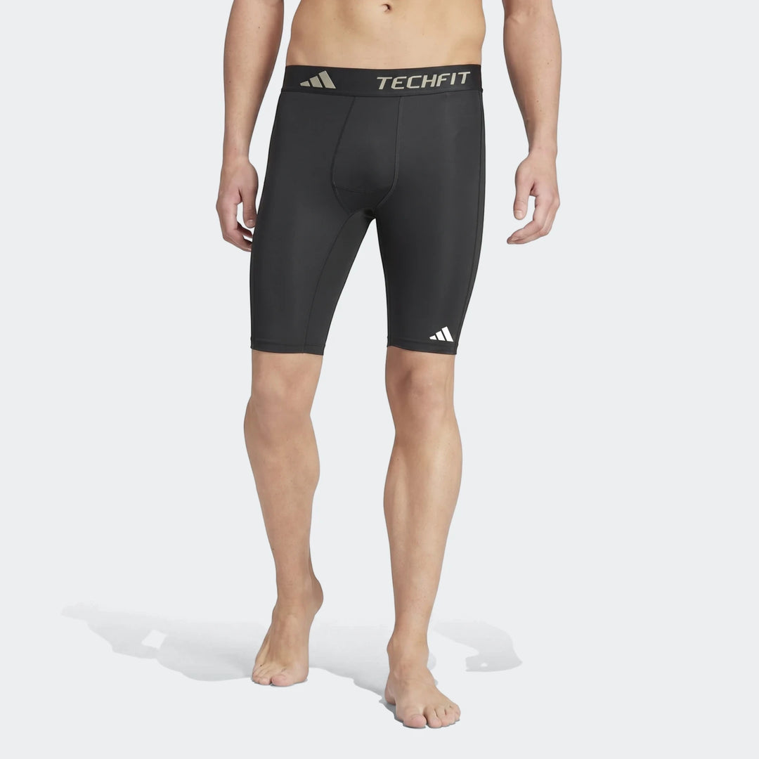 Men's black Adidas Techfit Football Base Layer Short Tights, designed for compression and performance, shown front view.
