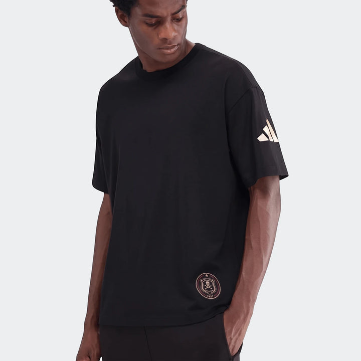 Men's black Sportswear Open Hem Single Jersey T-Shirt worn by a model, featuring Adidas and Orlando Pirates logos.