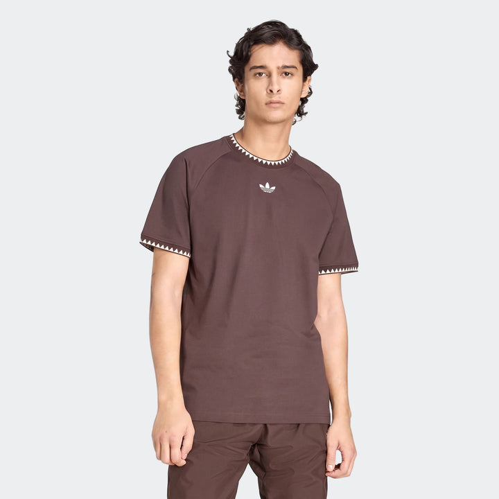 Men's brown Chest Stripe Short Sleeve T-Shirt featuring a white stripe pattern on the collar and sleeves, with an Adidas