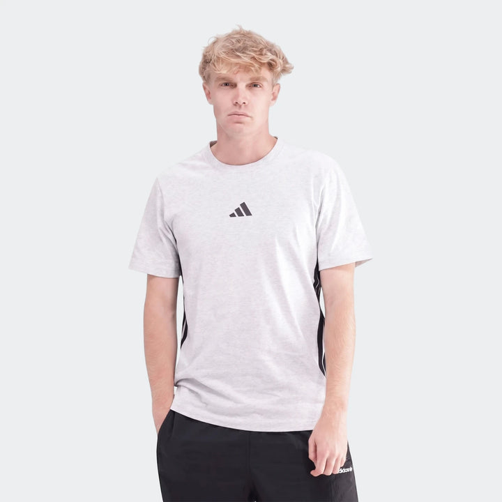 Men's light grey marl Adidas 3-Stripes Single Jersey T-Shirt worn by a blonde model, featuring a black logo and side stripes.