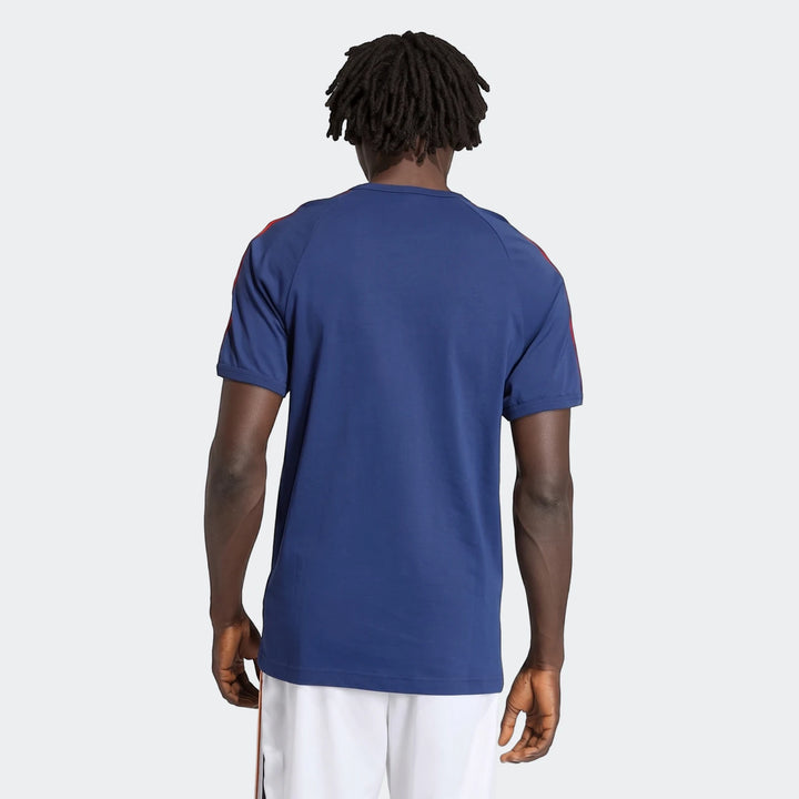 Men's navy blue 3-Stripes T-Shirt in a back view, worn by a model showcasing the short-sleeve design with red shoulder
