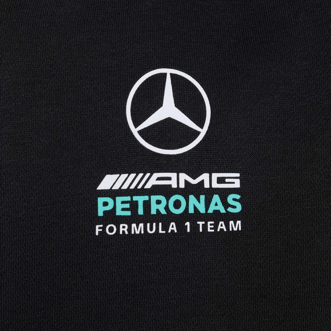Black Mercedes-AMG Petronas Formula 1 Team kids' full-zip hoodie with white Mercedes logo and teal text.