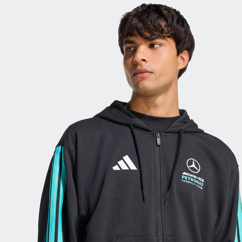 Black Mercedes-Amg Petronas Formula 1 Team Dna Full-Zip Hoodie worn by a male model, showcasing the front with brand logos