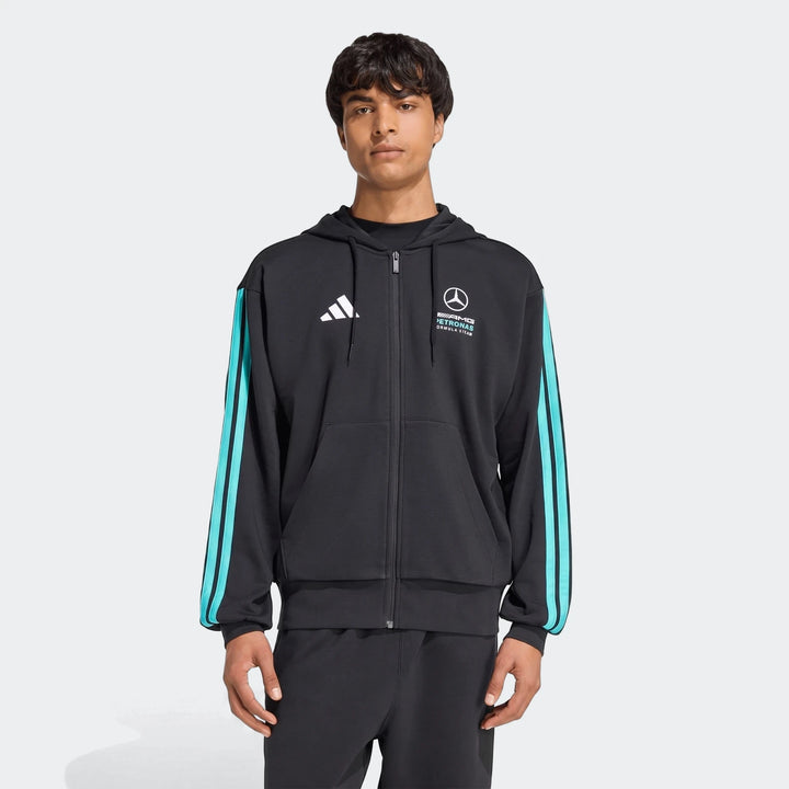 Men's black Mercedes-Amg Petronas Formula 1 Team Dna full-zip hoodie with blue sleeve stripes on a male model.